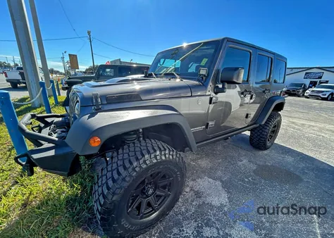 2016 Jeep Wrangler Unlimited Rubicon из США, поврежденный, VIN 1C4BJWFG9GL235583